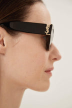 Black almond shape featuring bold YSL logo – tHE MYTHIC YSL SIGNATURE IS INTEGRATED AS AN HINGE DETAIL AND MADE HIGHLY VISIBLE ON – LUX VERSE Luxury Designer Fashion Outlet