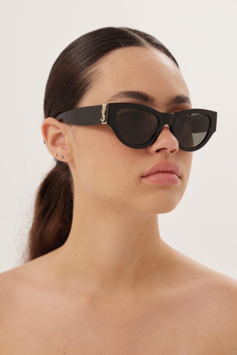 Black almond shape featuring bold YSL logo – tHE MYTHIC YSL SIGNATURE IS INTEGRATED AS AN HINGE DETAIL AND MADE HIGHLY VISIBLE ON – LUX VERSE Luxury Designer Fashion Outlet