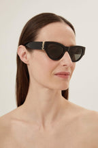 Black almond shape featuring bold YSL logo – tHE MYTHIC YSL SIGNATURE IS INTEGRATED AS AN HINGE DETAIL AND MADE HIGHLY VISIBLE ON – LUX VERSE Luxury Designer Fashion Outlet