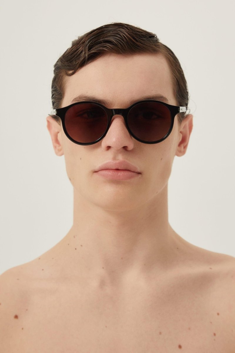 Circular black sunglasses – the style features a nice play on front acetate colors, transparent temples, – LUX VERSE Luxury Designer Fashion Outlet