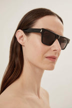 Squared black angular sunglasses – tHE RECTANGULAR SHAPE IS DISTINGUISHED BY THICK TEMPLES WITH THE LOGO – LUX VERSE Luxury Designer Fashion Outlet